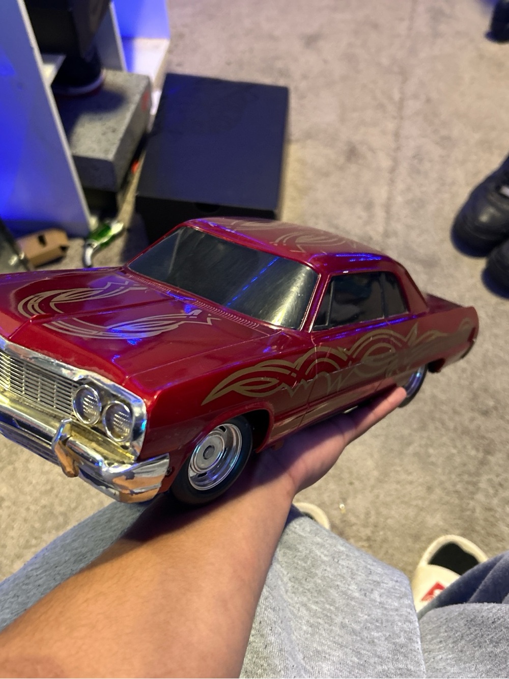 Glossy Red Diecast Lowrider with Gold Pinstripe Flames